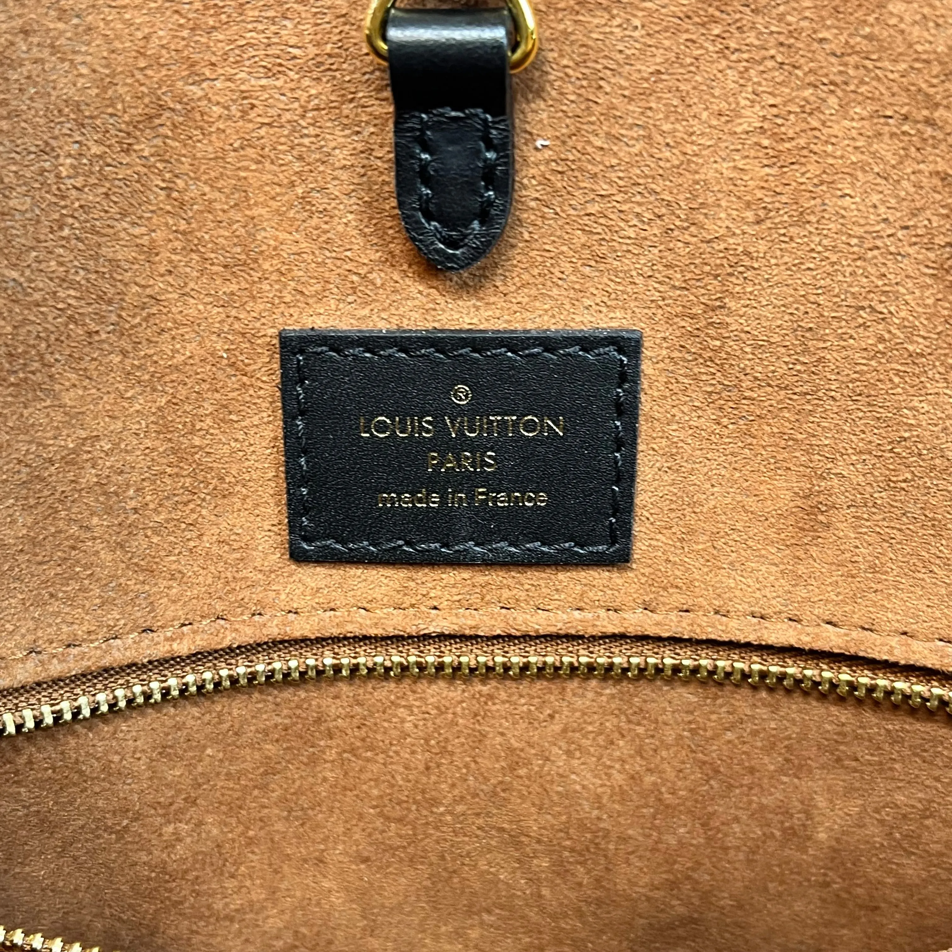 LOUIS VUITTON Onthego MM Brown Empreinte Monogram Giant Wild At Heart Tote Bag