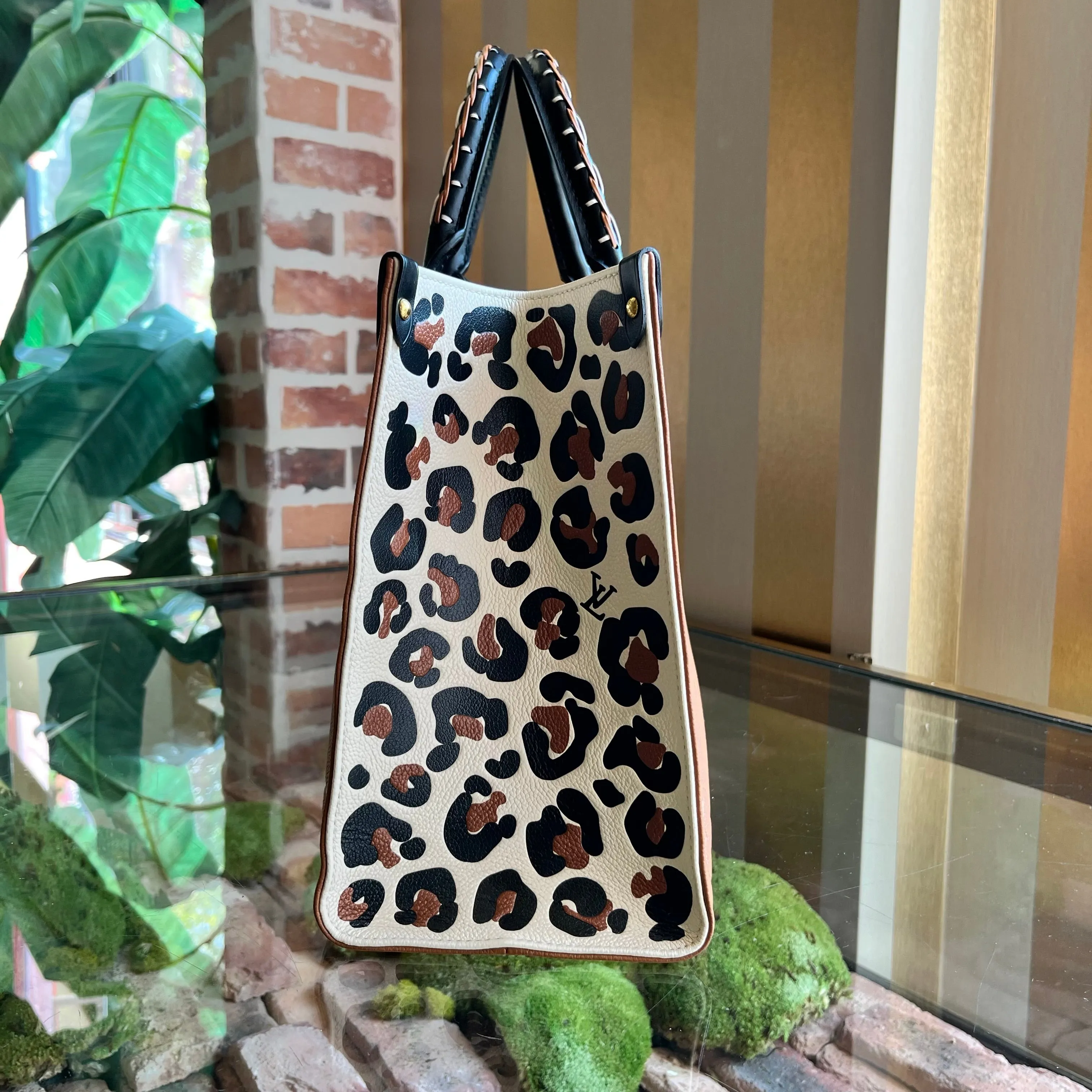 LOUIS VUITTON Onthego MM Brown Empreinte Monogram Giant Wild At Heart Tote Bag